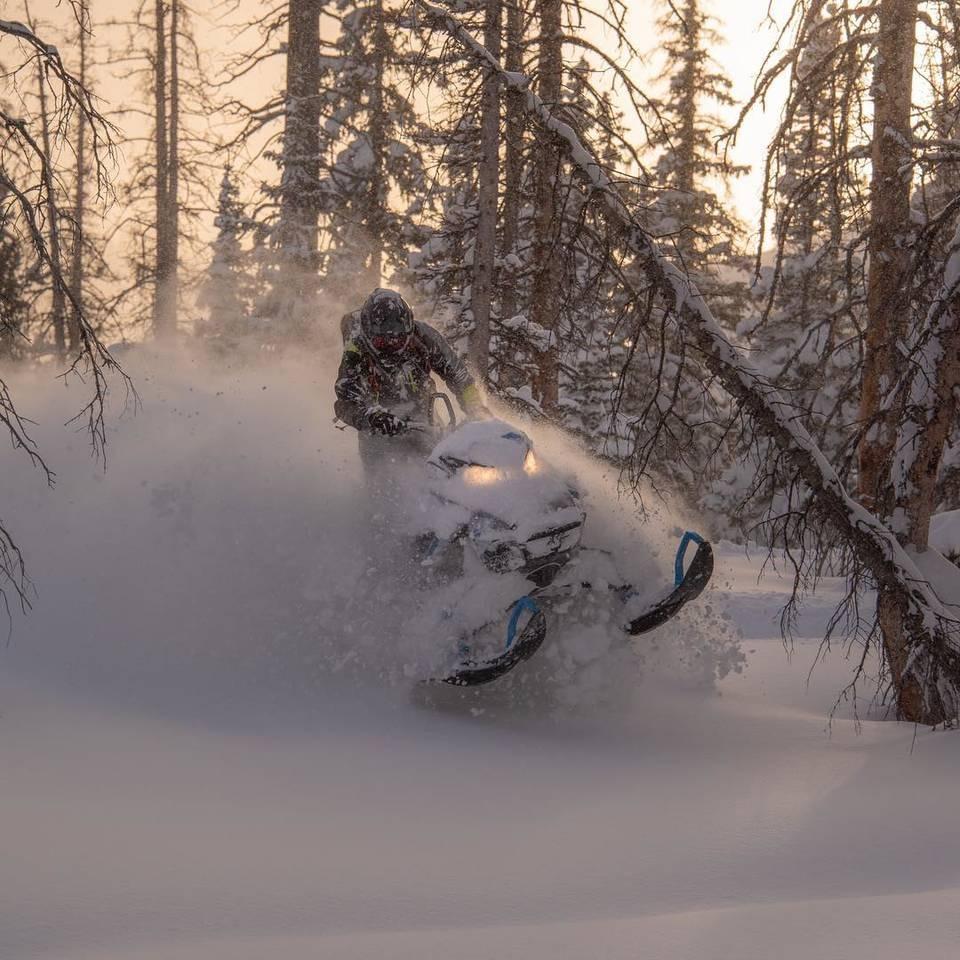 Snowmobiling and more during family adventure tours presented by Utah's Best Vacation Rentals.
